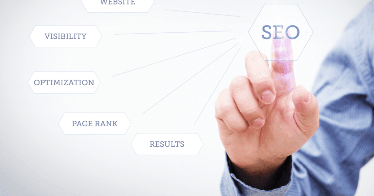 Image d'illustration d'un main qui touche un écran avec le terme SEO.